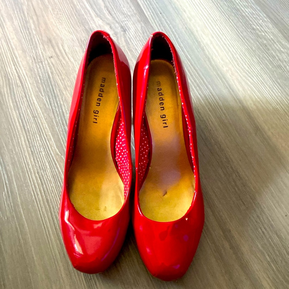 Red patent leather madden girl heels, size 10.